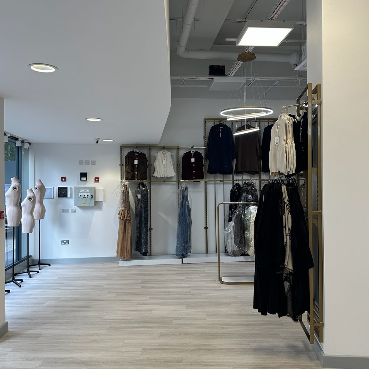 Clothing rails in the Abaci pop-up store fitted out by BRX London at Westfield Croydon